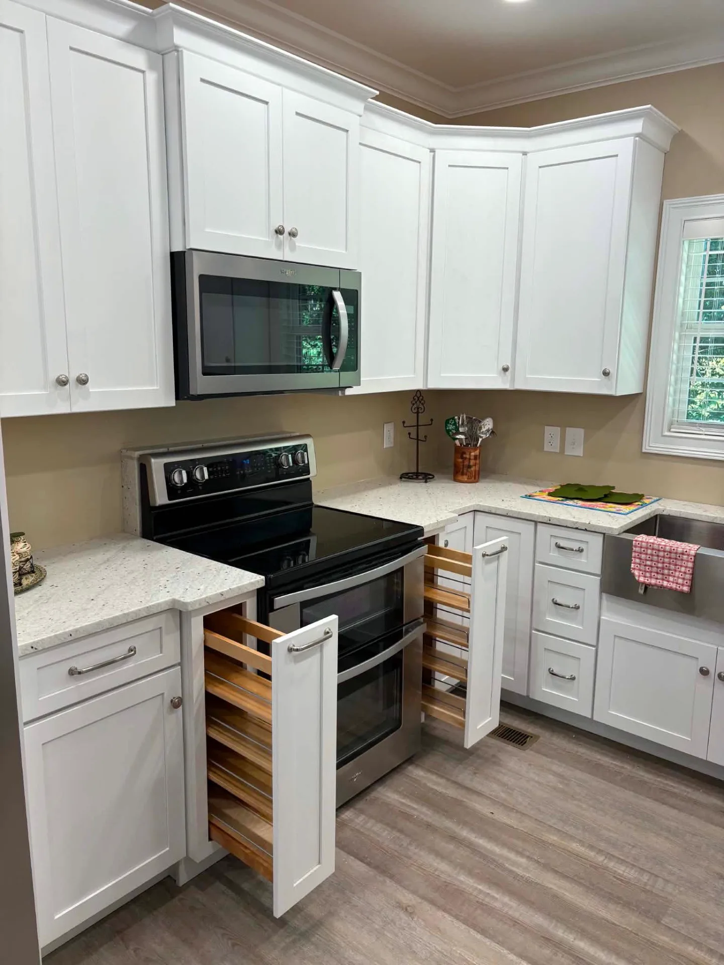 Spice Pull-Outs, Range Wall — Kitchen cabinetry installed by Howard's Cabinet Installation