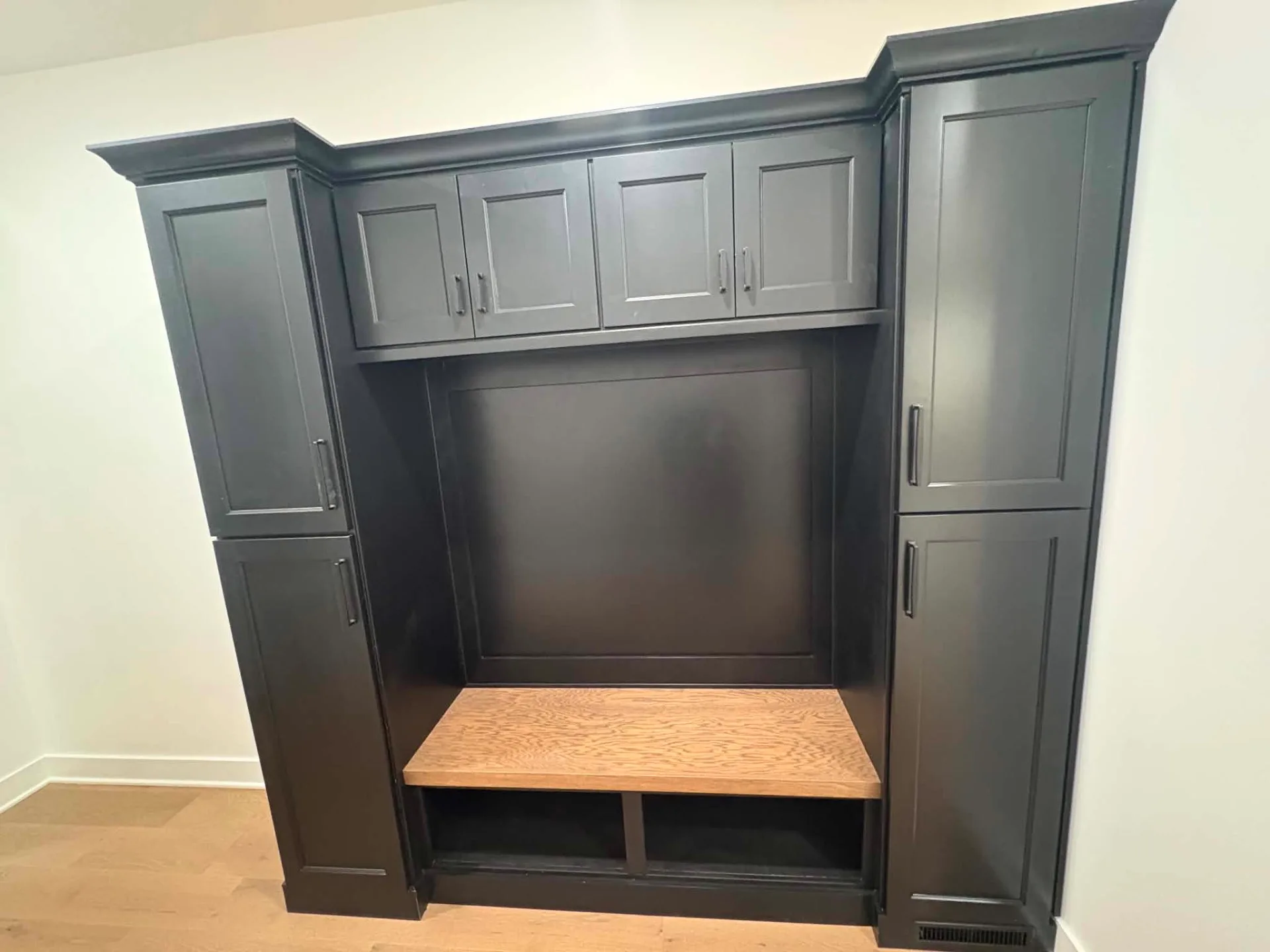 Black Mudroom Locker, Built-In Bench — Custom Piece cabinetry installed by Howard's Cabinet Installation